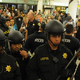 BART riot police engage protesters. (Google)